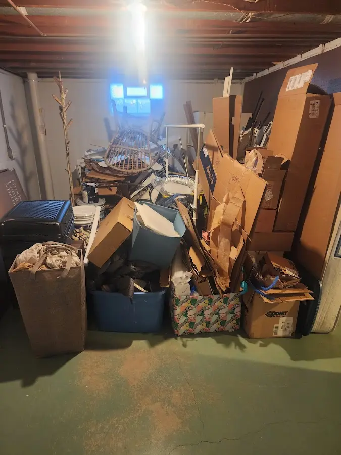 Roll-off dumpster container at job site for 2 Yard Dumpster Rental in Mansfield